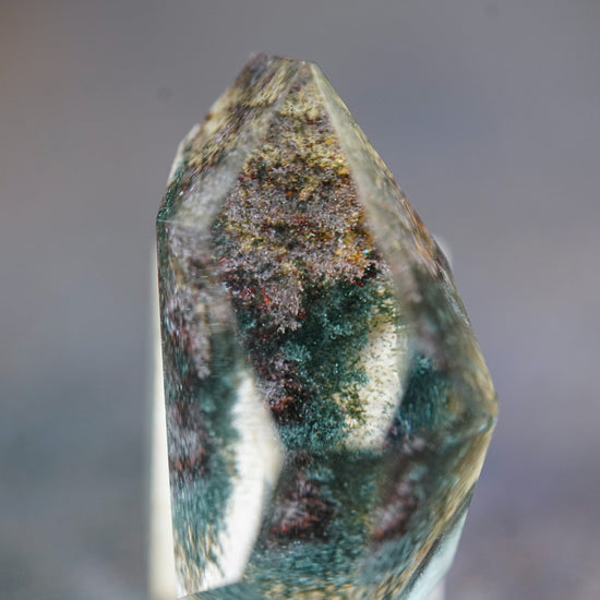 Close up shot of rainbow multi-colored Garden Quartz Crystal