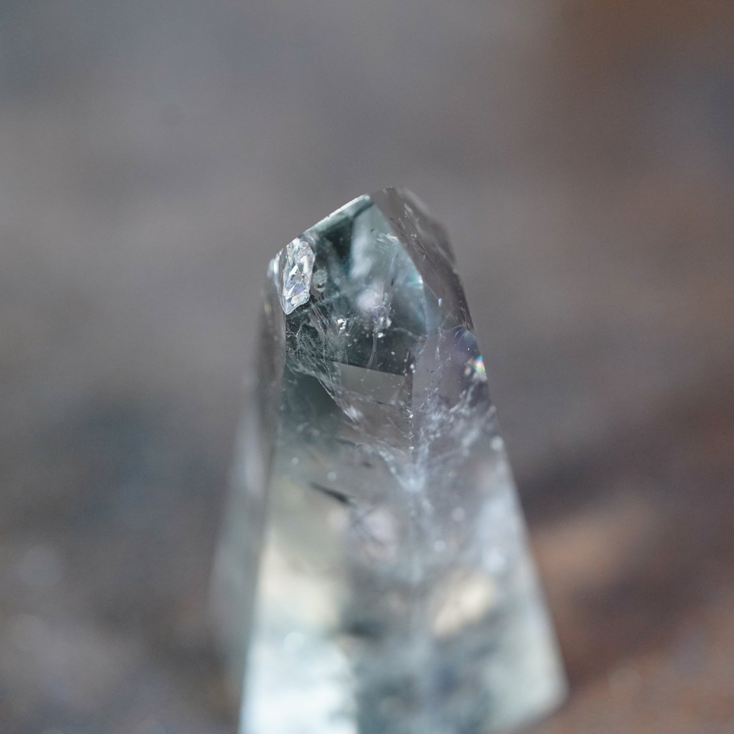 Macro close up photo of tip on Green Prasiolite crystal tower