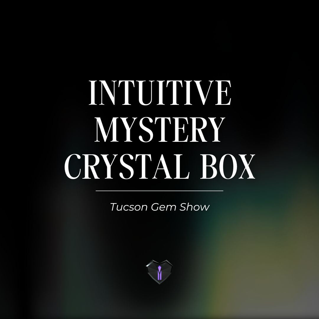 Text on a black and green background that says Intuitive Mystery Crystal Box - Tucson Gem Show with the AmarisLand logo.