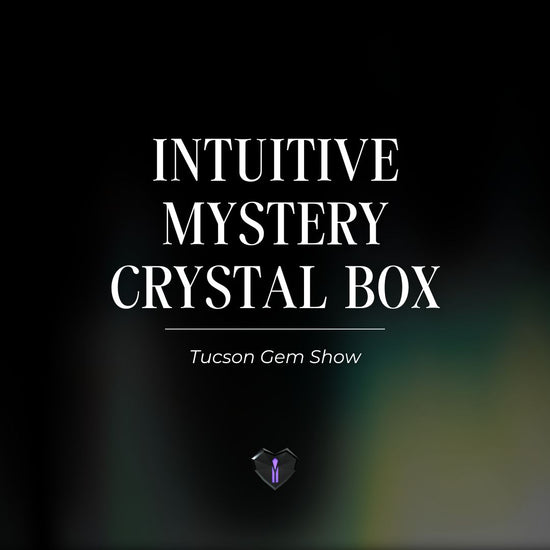 Text on a black and green background that says Intuitive Mystery Crystal Box - Tucson Gem Show with the AmarisLand logo.